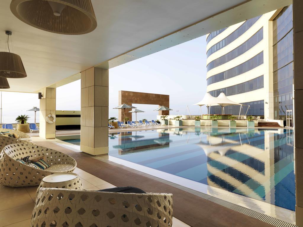 Symphony Style Hotel Kuwait Salmiya Екстериор снимка The pool at the hotel